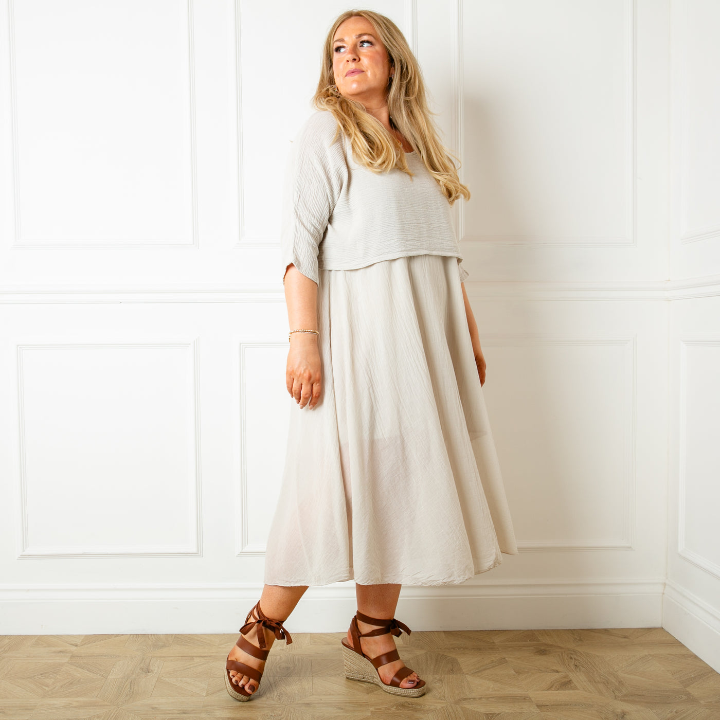 The stone cream Two Piece Dress with a top that has 3/4 length sleeves and a round neckline