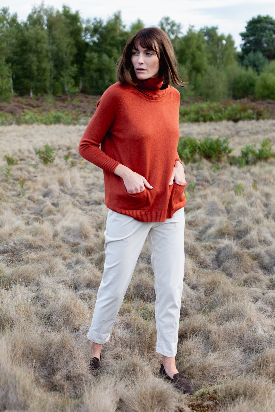 Two Pocket Roll Neck Jumper