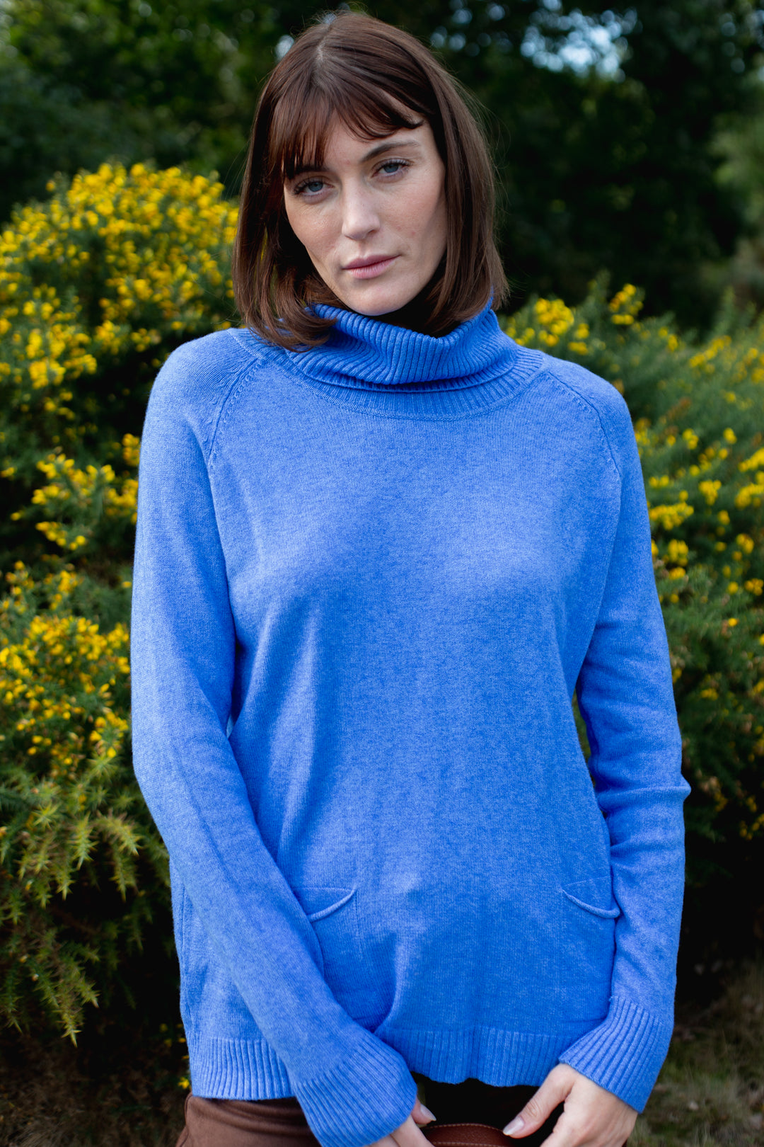 Two Pocket Roll Neck Jumper