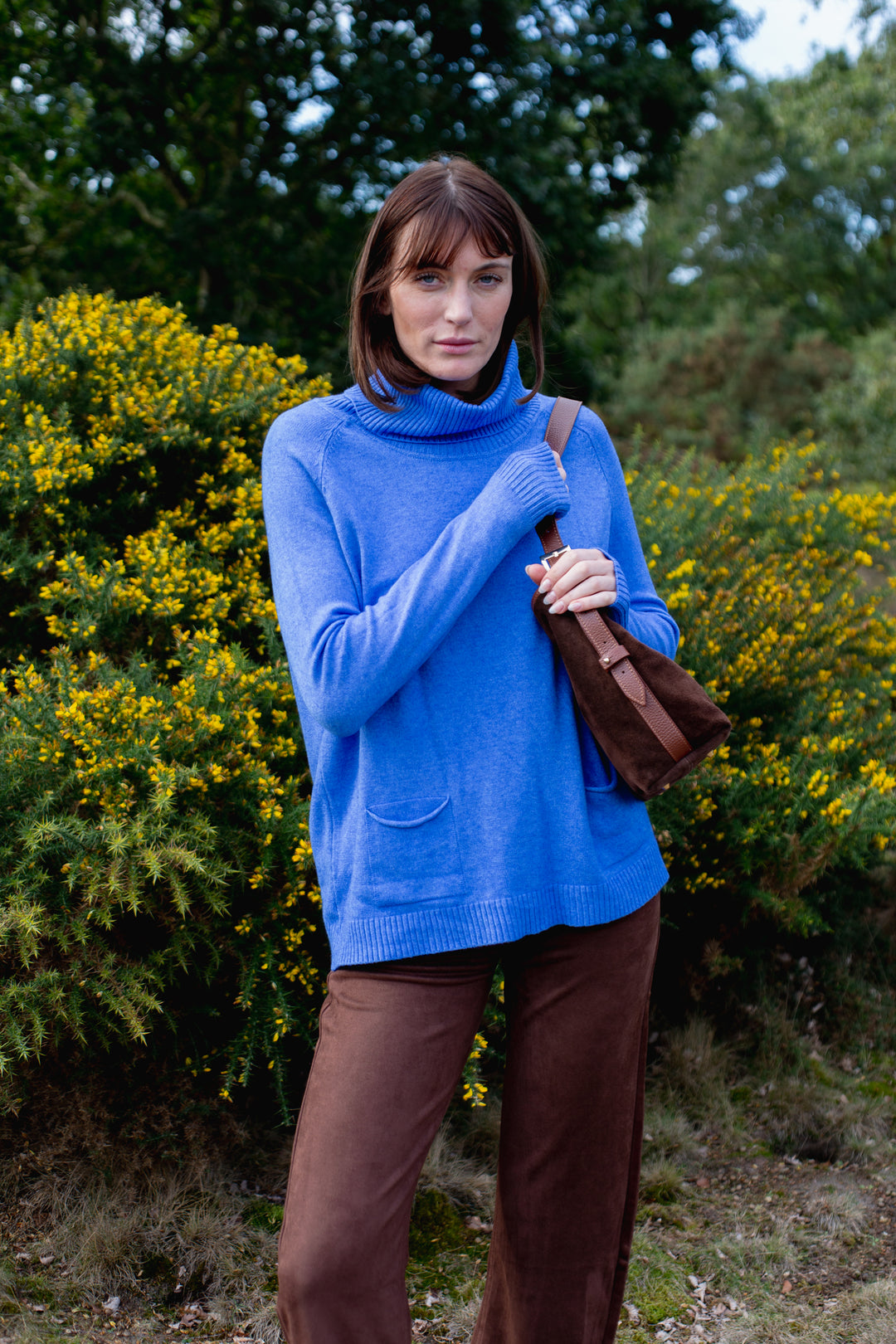 Two Pocket Roll Neck Jumper