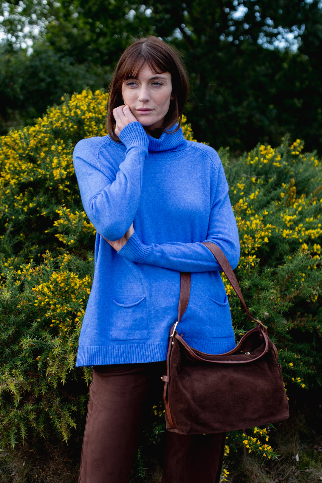 Two Pocket Roll Neck Jumper