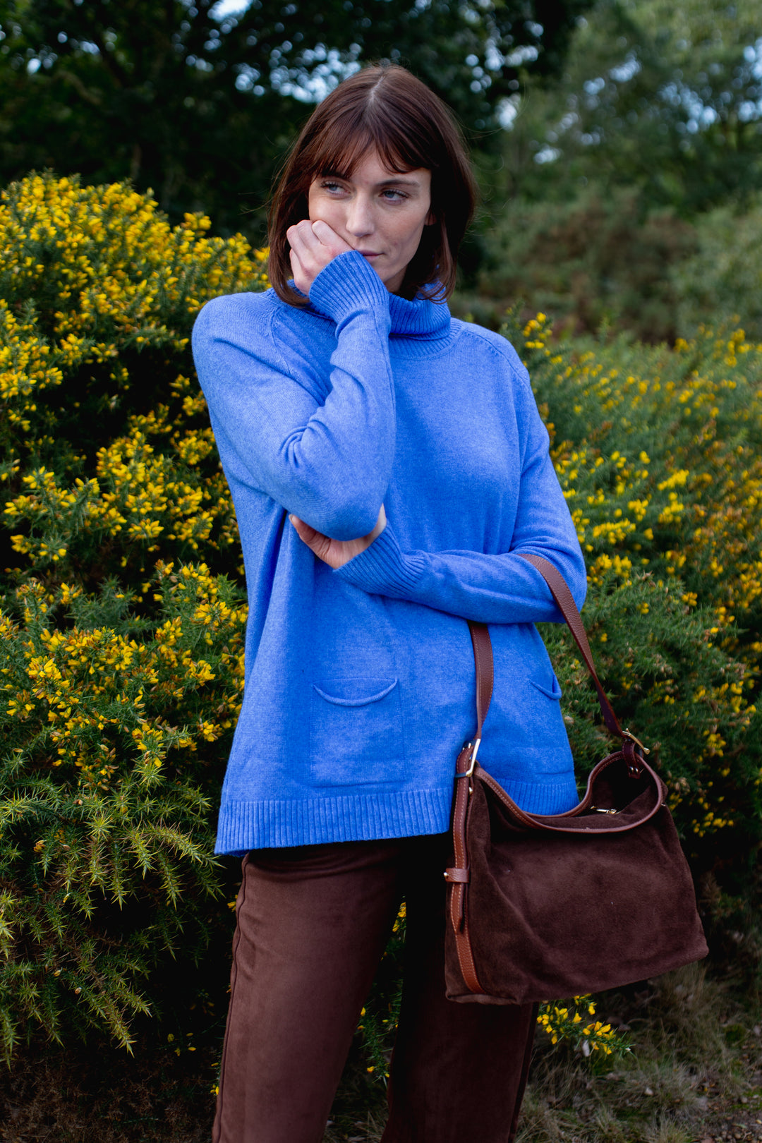 Two Pocket Roll Neck Jumper