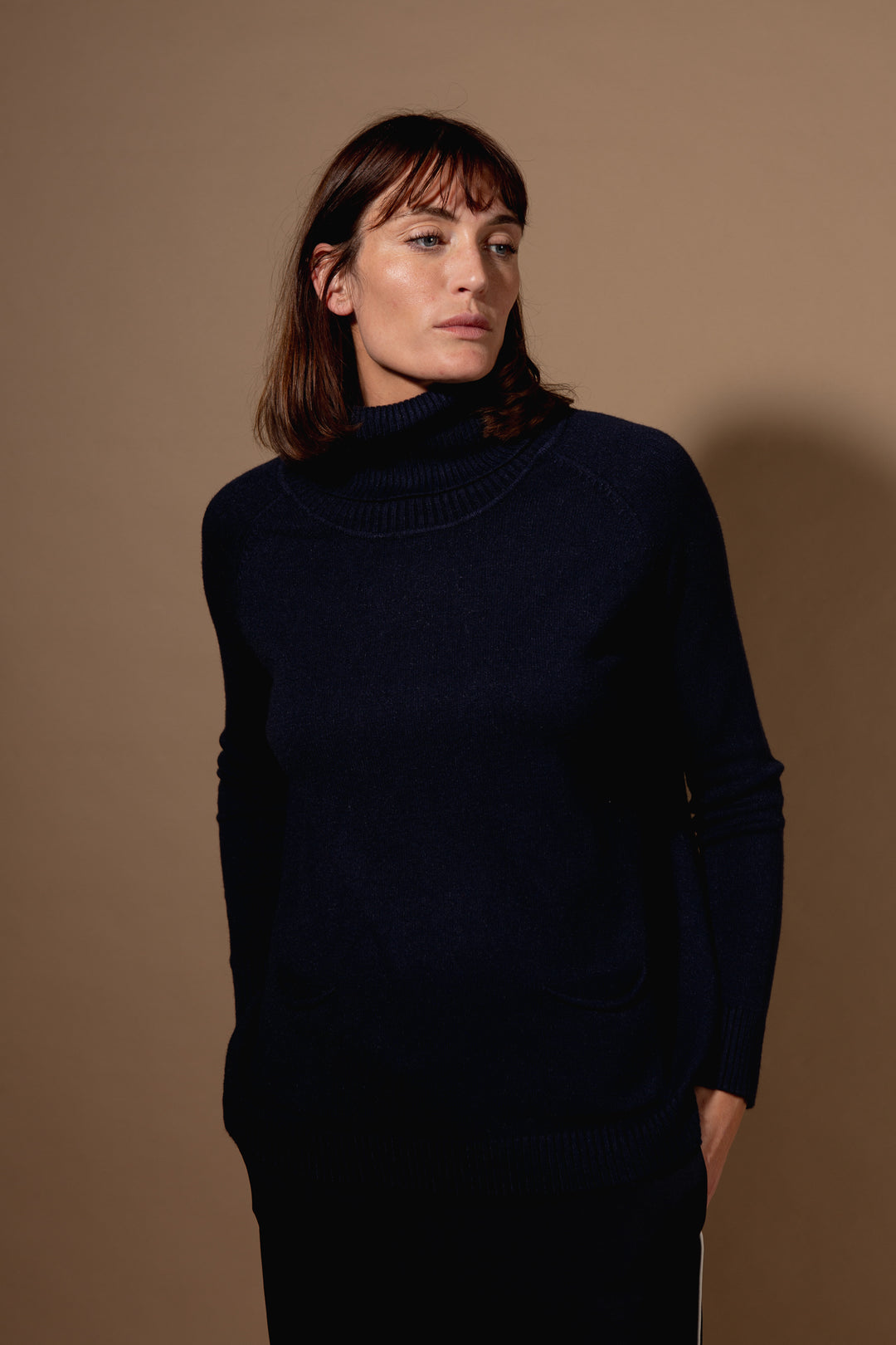 Two Pocket Roll Neck Jumper