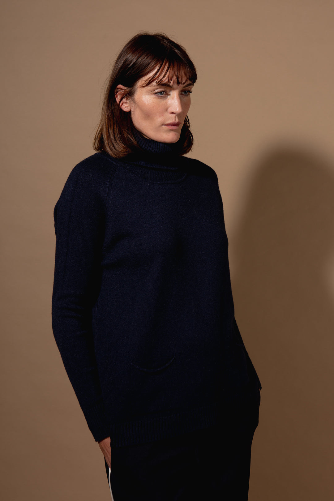 Two Pocket Roll Neck Jumper