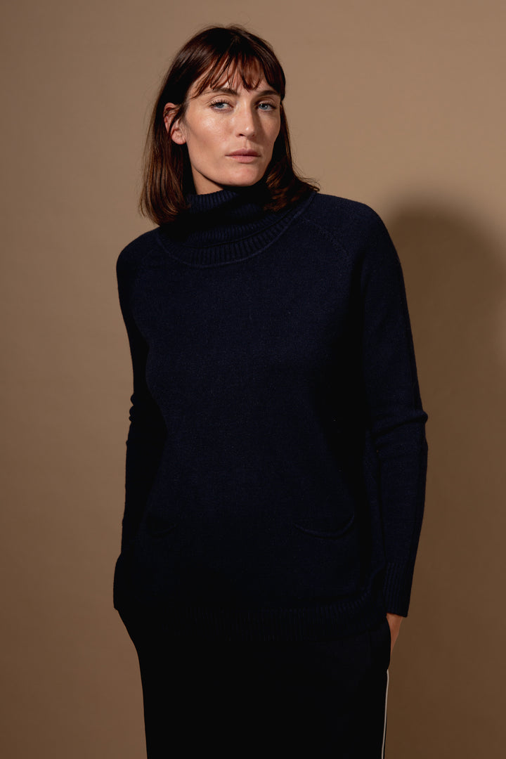 Two Pocket Roll Neck Jumper