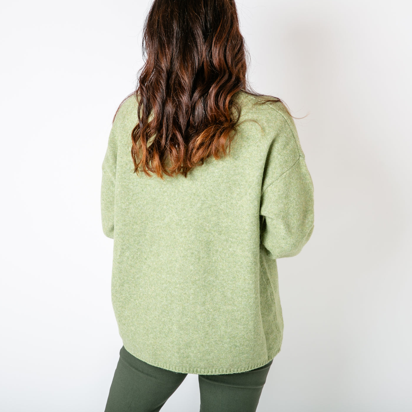 The pistachio green V Neck Seam Front Jumper made from a blend of recycled polyester