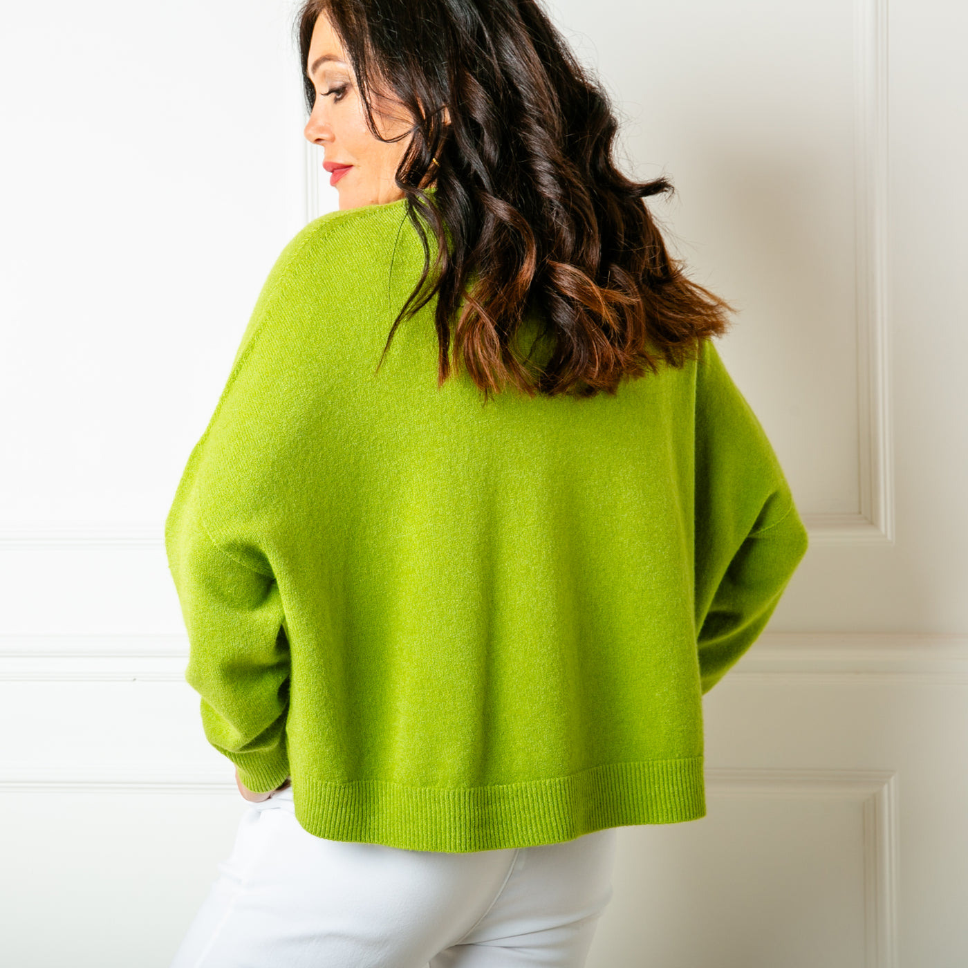 The chartreuse green V Neck Short Jumper made from a fine knitted blend perfect for summer evenings