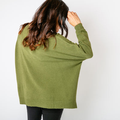 The khaki green V Neck Split Jumper with long sleeves and a v neckline