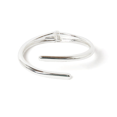 The Verity Twist Bangle in silver which makes the perfect finishing touch for an everyday outfit or a dressed up look