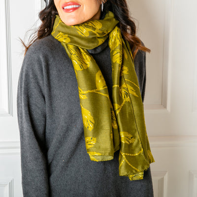 The Vienna Scarf in green. perfect for adding a pop of colour to any outfit