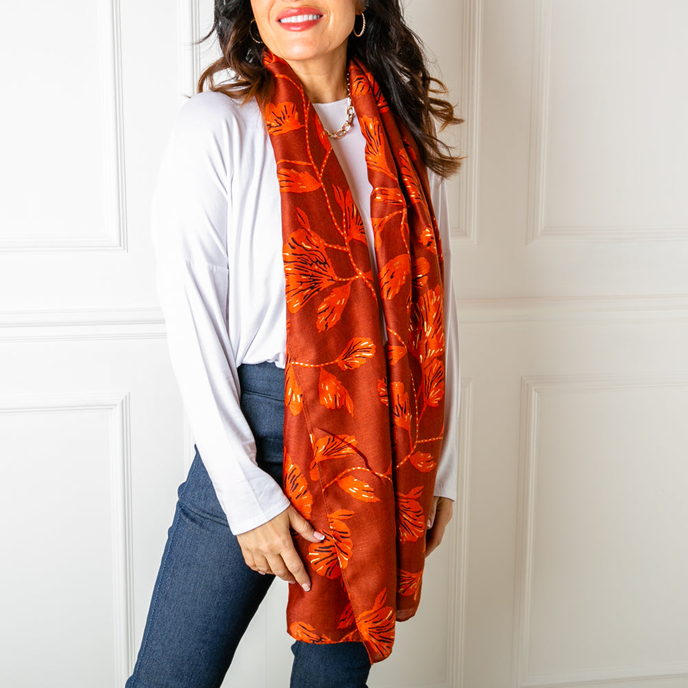 The Vienna Scarf in orange made from a blend of cotton and viscose