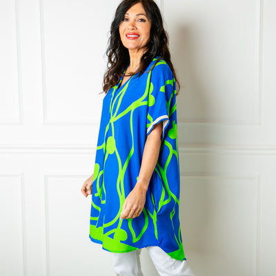 The Royal Blue Vine Short Sleeved Tunic Dress with short sleeves that have contrasting elasticated cuffs around the edges