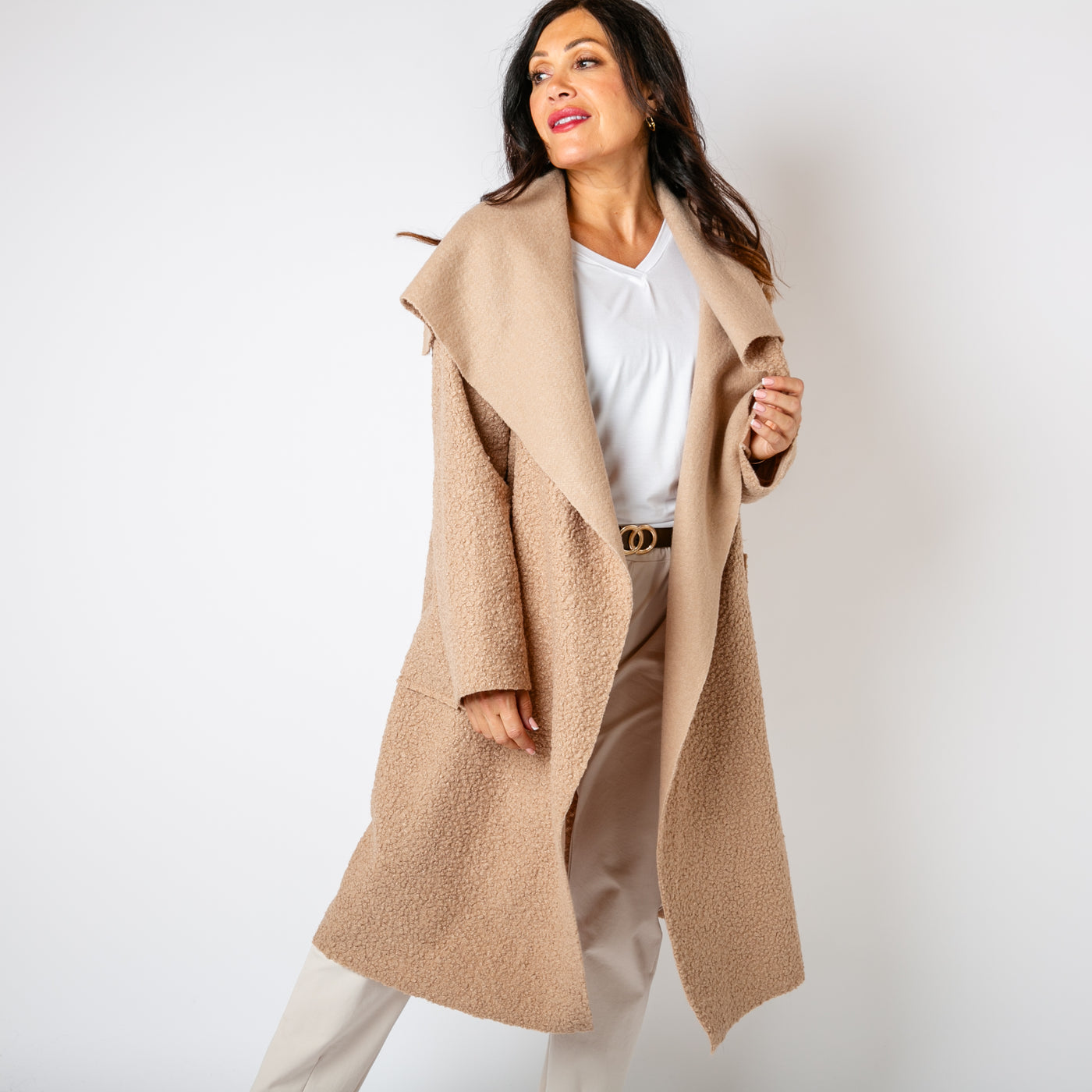 The oatmeal brown Waterfall Roll Sleeve Coat with long sleeves and pockets on either side 