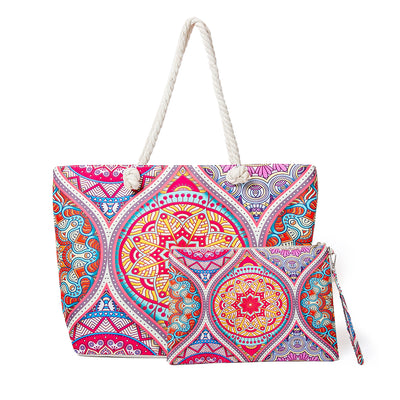 The pink Seville Waterproof Beach Bag that comes with a large matching zip up purse in the same pattern