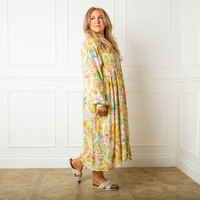 The yellow chartreuse Wild Garden Maxi Dress made from a lightweight viscose material in a beautiful detailed floral print pattern
