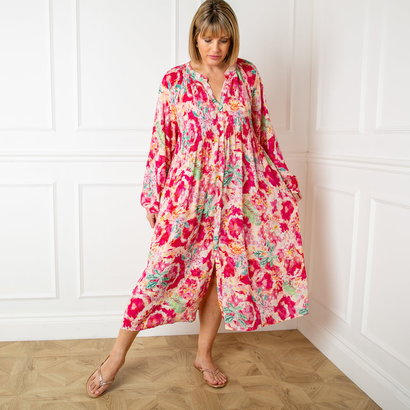The pink Wild Garden Maxi Dress made from a lightweight viscose material in a beautiful detailed floral print pattern