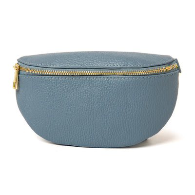 The denim blue Winchester Leather Handbag which can be worn as a bum bag belt bag