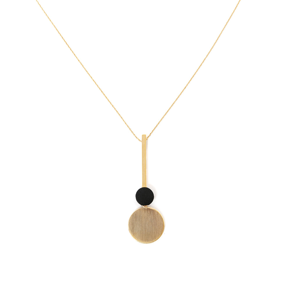 The Winona Necklace with black and gold circular pendants 