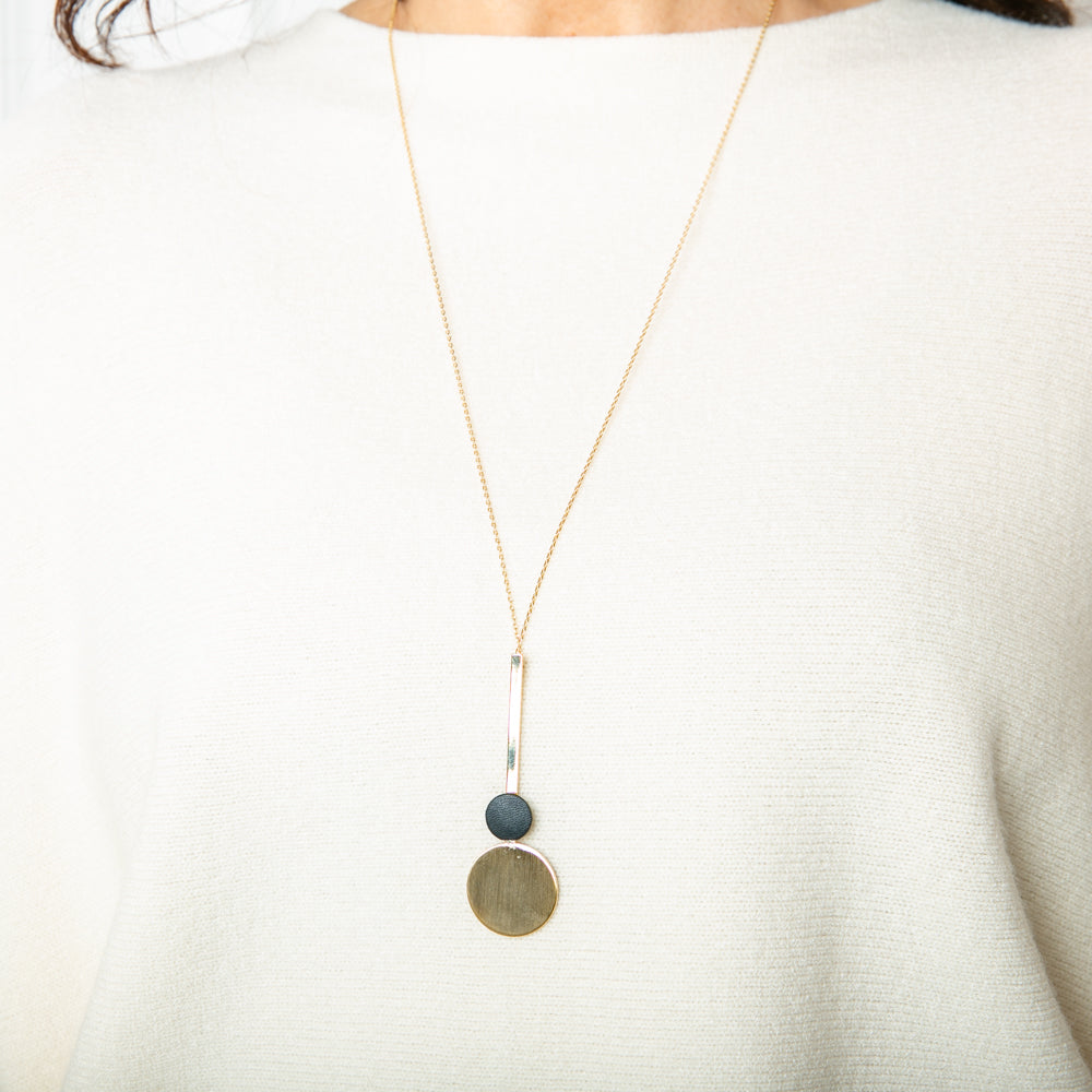 The Winona Necklace in black with a long chain that can be adjusted to the desired length 