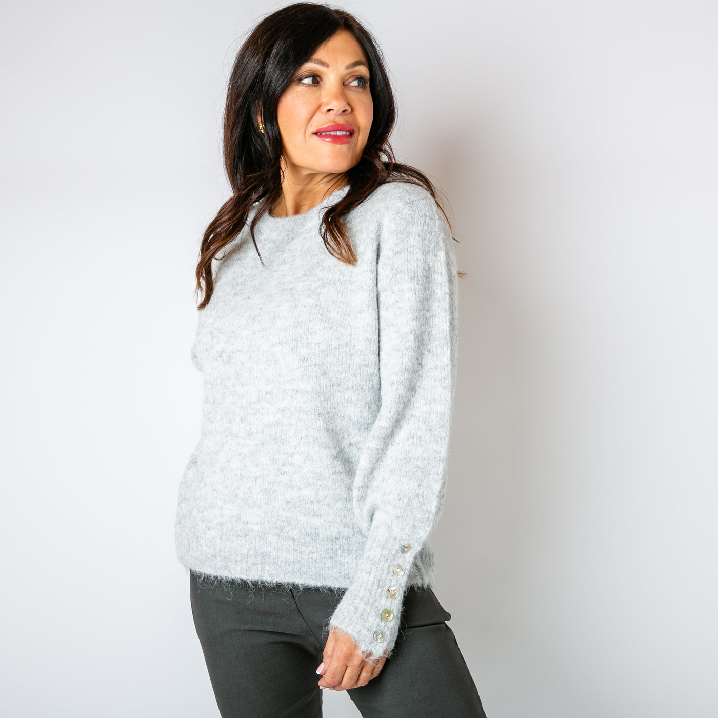 The silver grey Wool Button Jumper with button fastenings on either sleeve