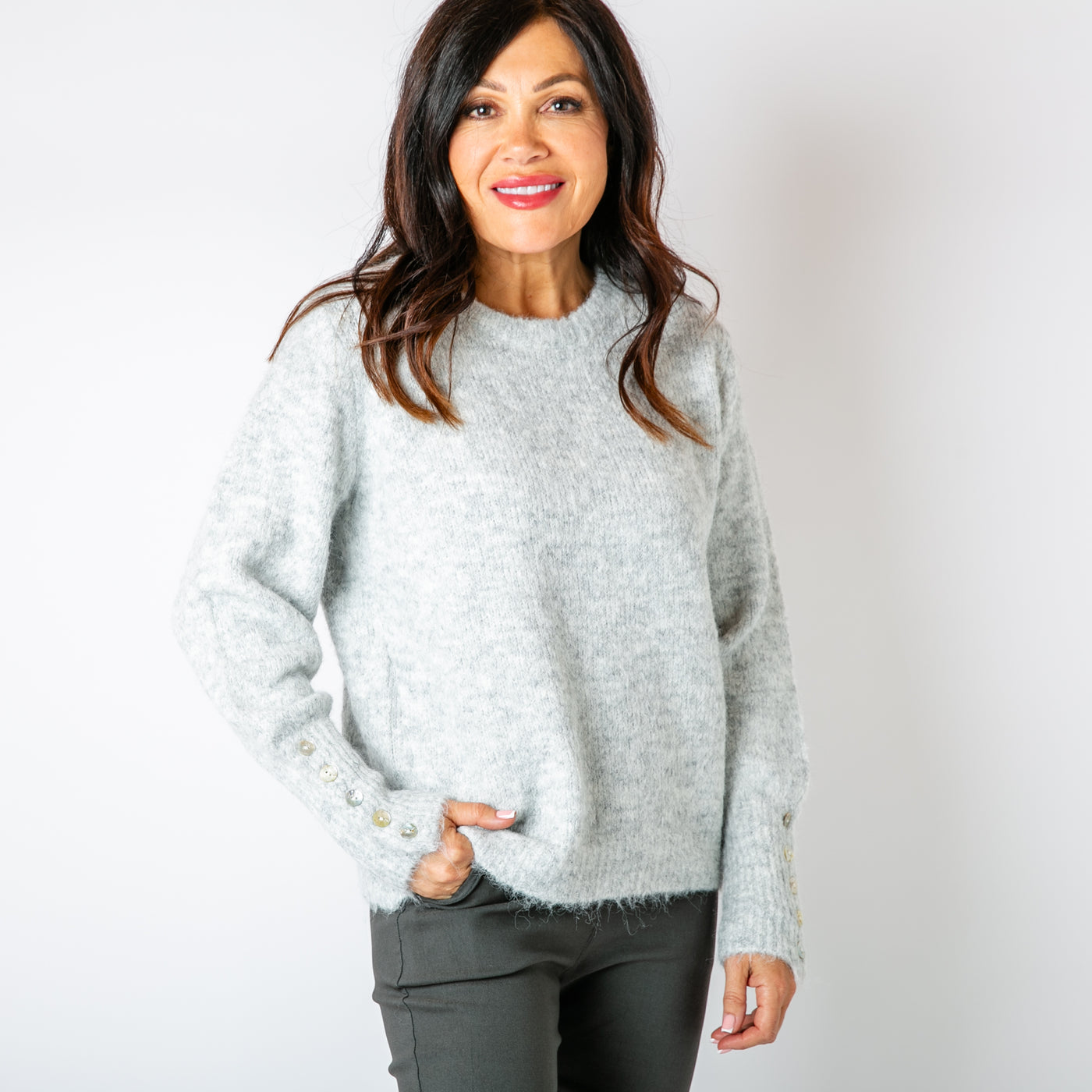 The silver grey Wool Button Jumper with a round crew neckline and long sleeves