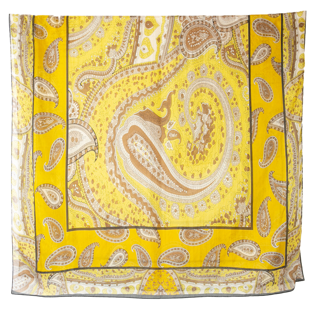 The Yellow Paisley Print Silk Scarf featuring a beautifully intricate paisley pattern design