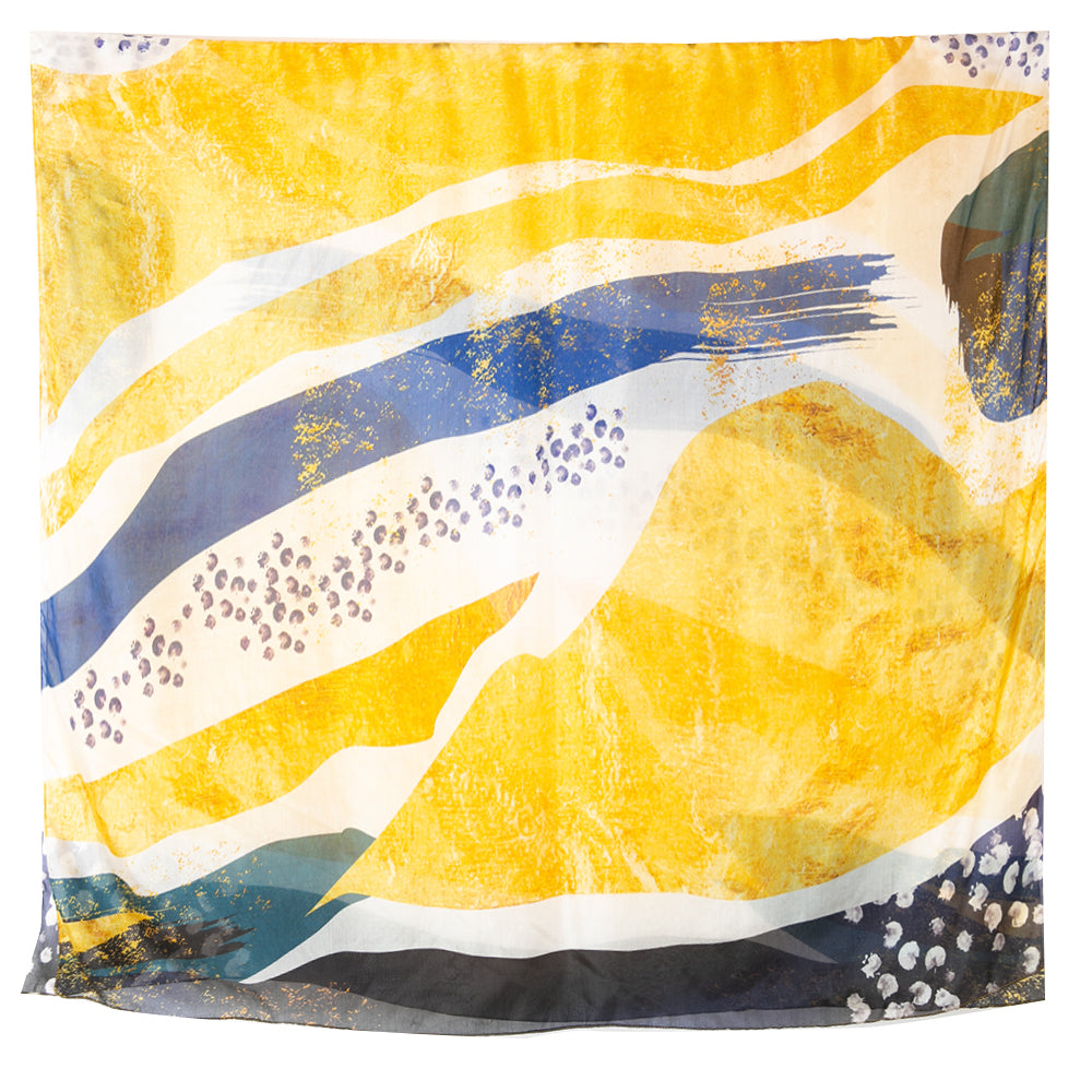 The Abstract Waves Silk Scarf featuring a beautoful abstract pattern reminiscent of the sea and the beach