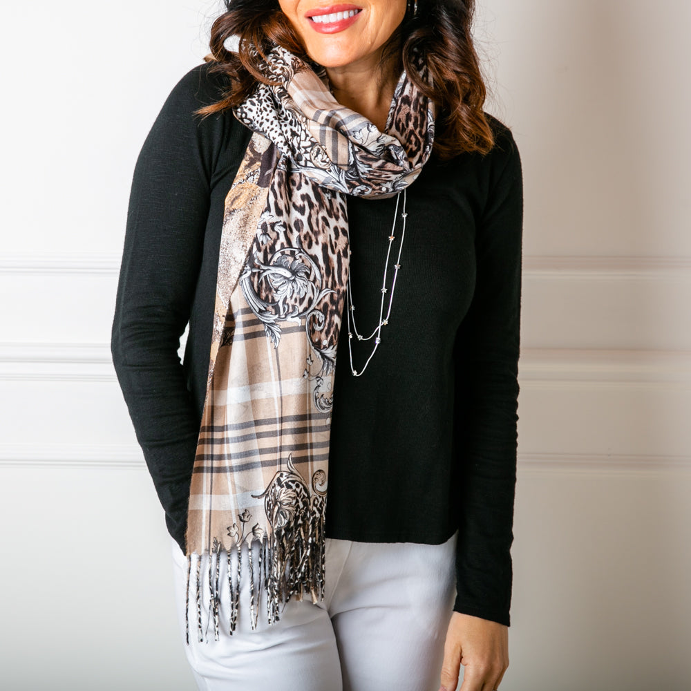 The Austin scarf in taupe brown worn by a model 