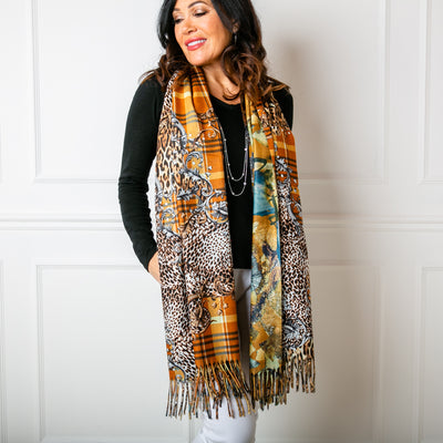 The Austin scarf in turmeric yellow worn by a model 