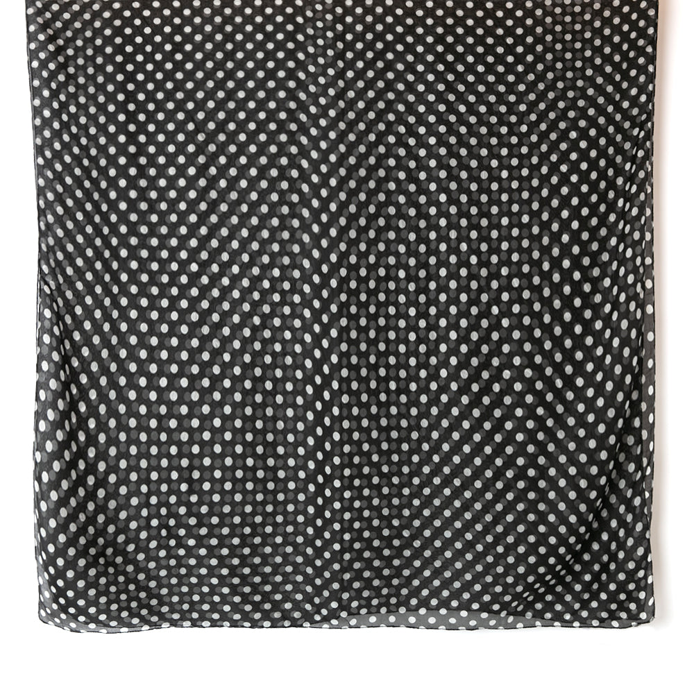 The Black Polka Dot Silk Scarf made from a beautifully soft and delicate 100% silk