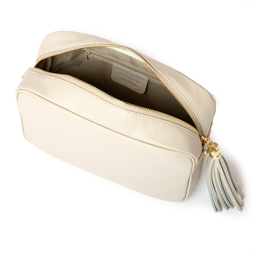 Cream Bloomsbury Italian Leather Cross Body Bag Leather tassel bag with gold hardware open bag shot