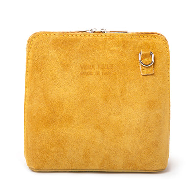 Bronte Suede Crossbody Bag in Mustard. Made from 100% Italian suede, shown from the front with silver hardware