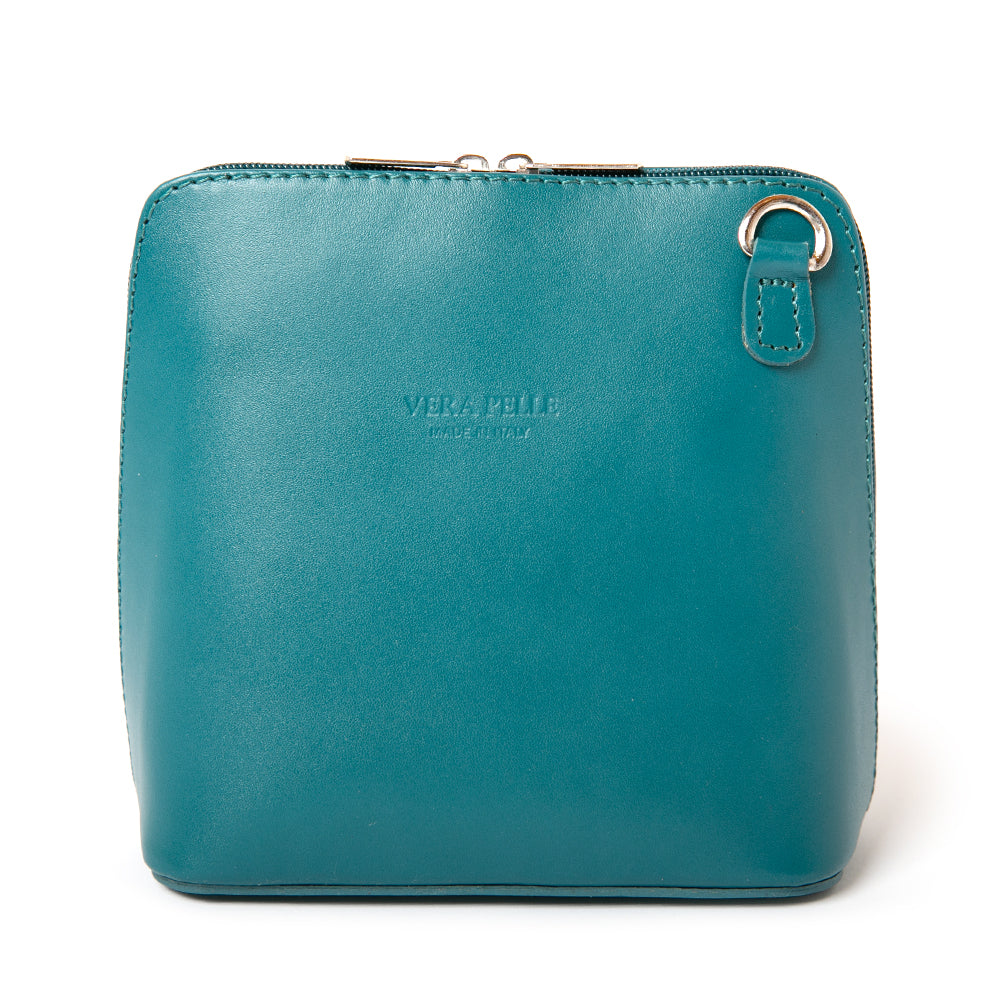 Bronte Crossbody Bag in Dark Teal. Made from 100% Italian leather, shown from the front with silver hardware