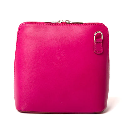 Bronte Crossbody Bag in Fuchsia Pink, front view with silver hardware. Made from Italian leather.