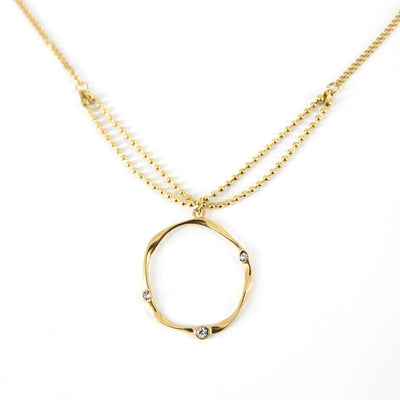 Delilah-womens-long-chain-necklace-circular-twisted-drop-pendant-diamante-detail-long-chain-gold-jewellery