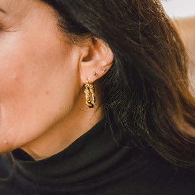 Katie-womens-medium-hoop-earrings-twisted-metal-design-womens-jewellery-gold