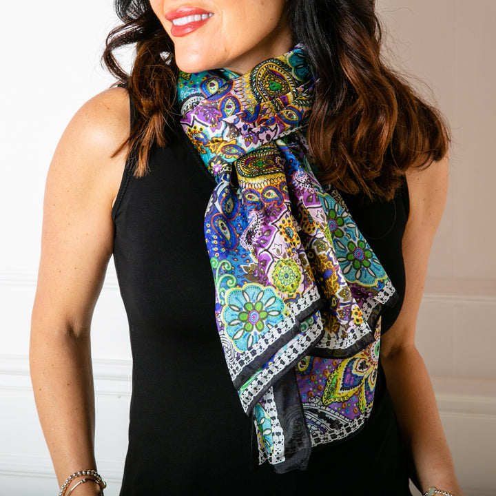 The Paisley Blossom Silk Scarf that makes the perfect finishing touch to any outfit.