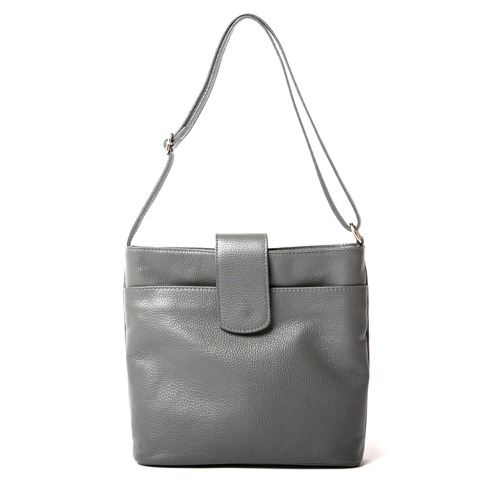 Pimlico Handbag in dark grey, shown from the front and including the adjustable leather strap, the fold over presstud fastening and the outside pocket. Made from Italian leather.