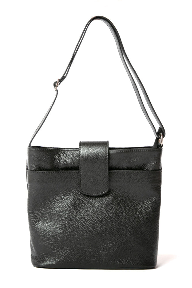 Pimlico Handbag in black, shown from the front and including the adjustable leather strap, the fold over presstud fastening and the outside pocket. Made from Italian leather.