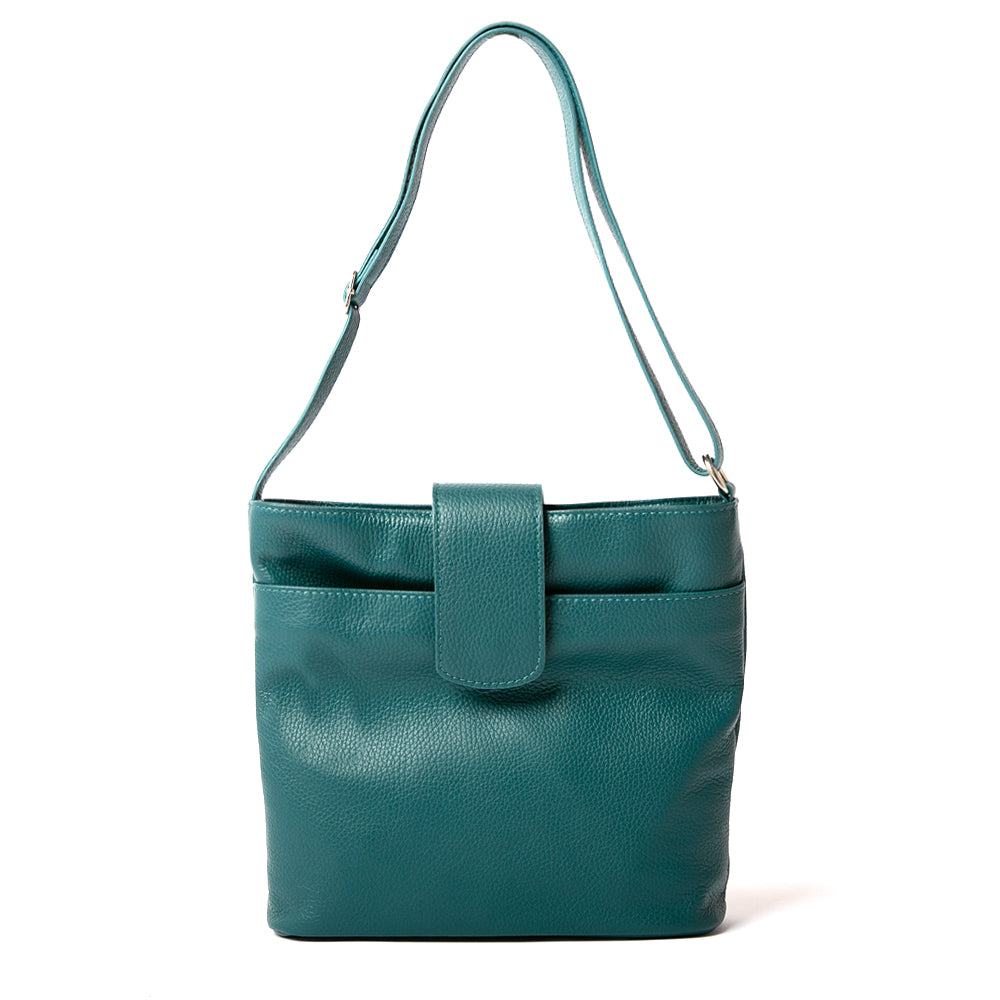 Pimlico Handbag in dark teal, shown from the front and including the adjustable leather strap, the fold over presstud fastening and the outside pocket. Made from Italian leather.