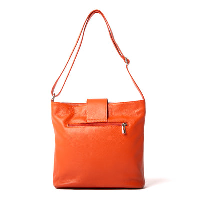 Pimlico Handbag in orange, shown from behind including matching leather adjustable strap and back zip pocket. Made from Italian leather.
