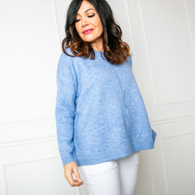 The Relaxed Fit Seam Jumper in denim blue with ribbed detailing around the neckline, cuffs and bottom hemline
