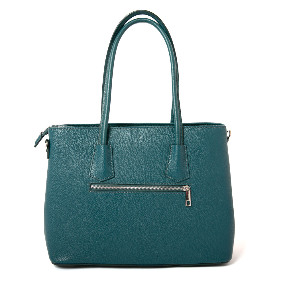 The Richmond Leather Handbag in Dark Teal with a zipped main compartment and silver metal hardware