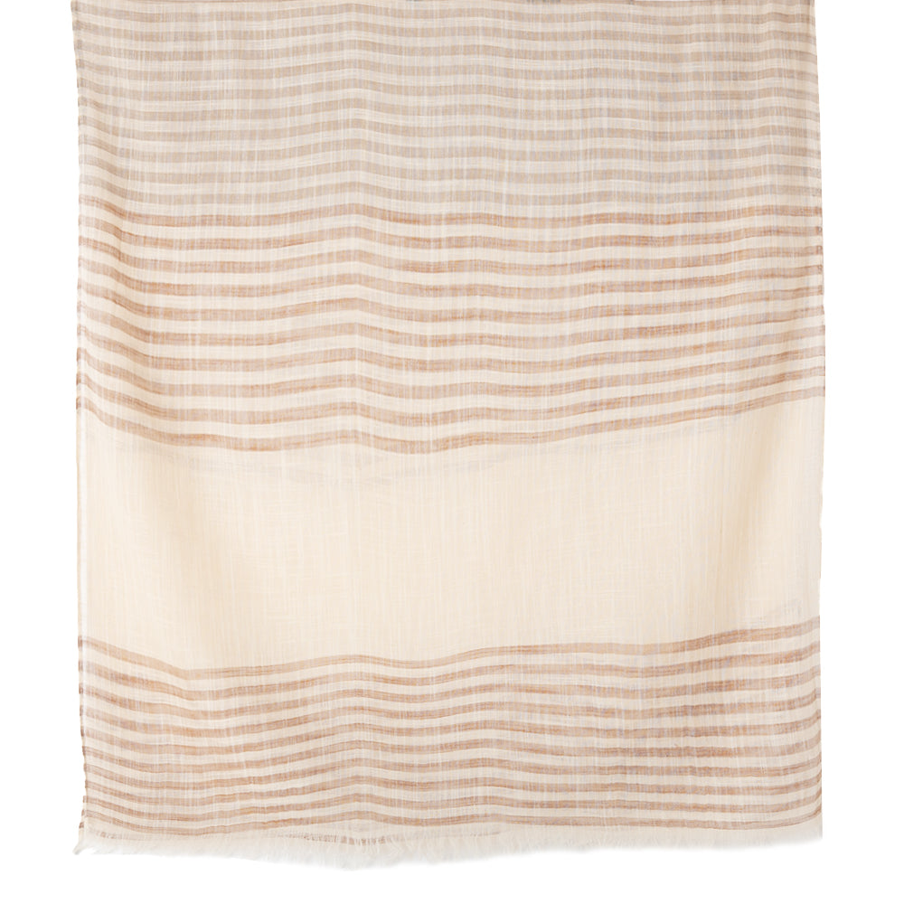 The Sandy Scarf in fudge brown featuring a striped pattern of different sizes and widths
