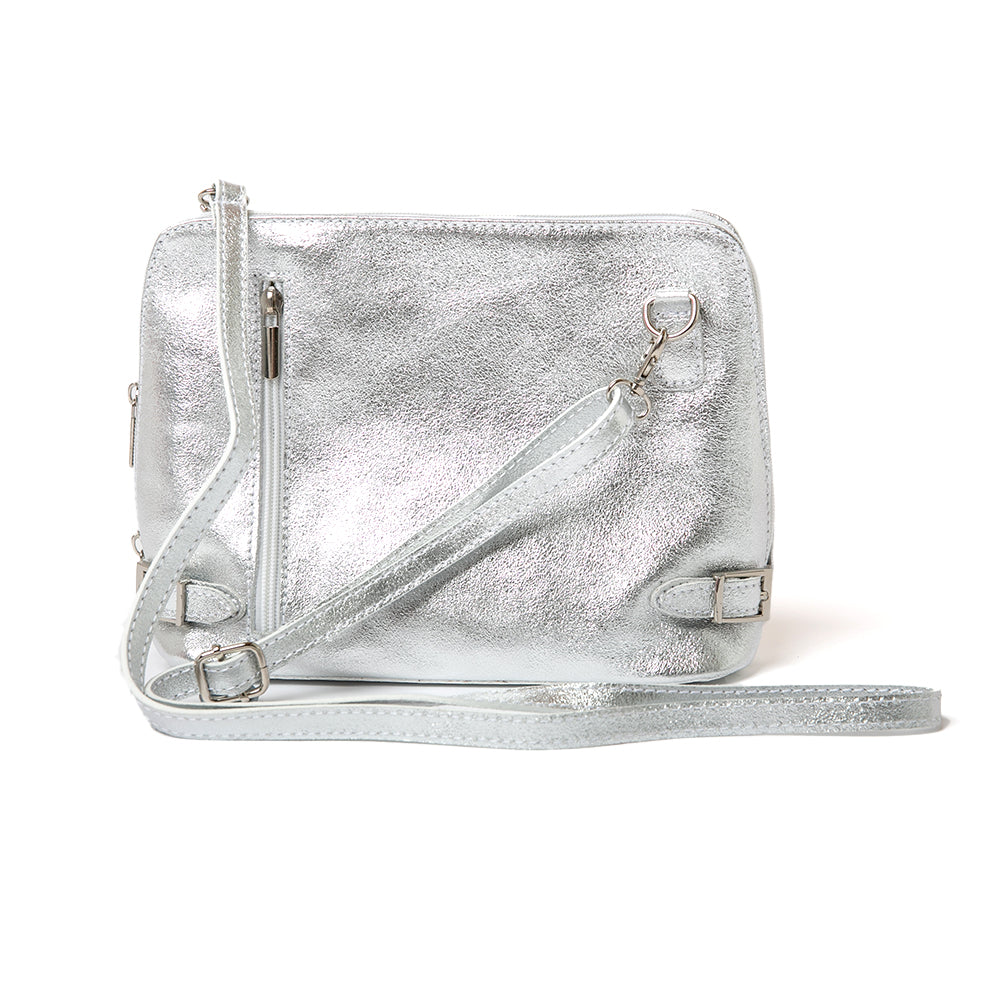 Metallic silver Italian leather Sloane Handbag, shown from the back, including the adjustable leather strap, three side zip fastening, buckle detail and the outside pocket. Extended strap shot.