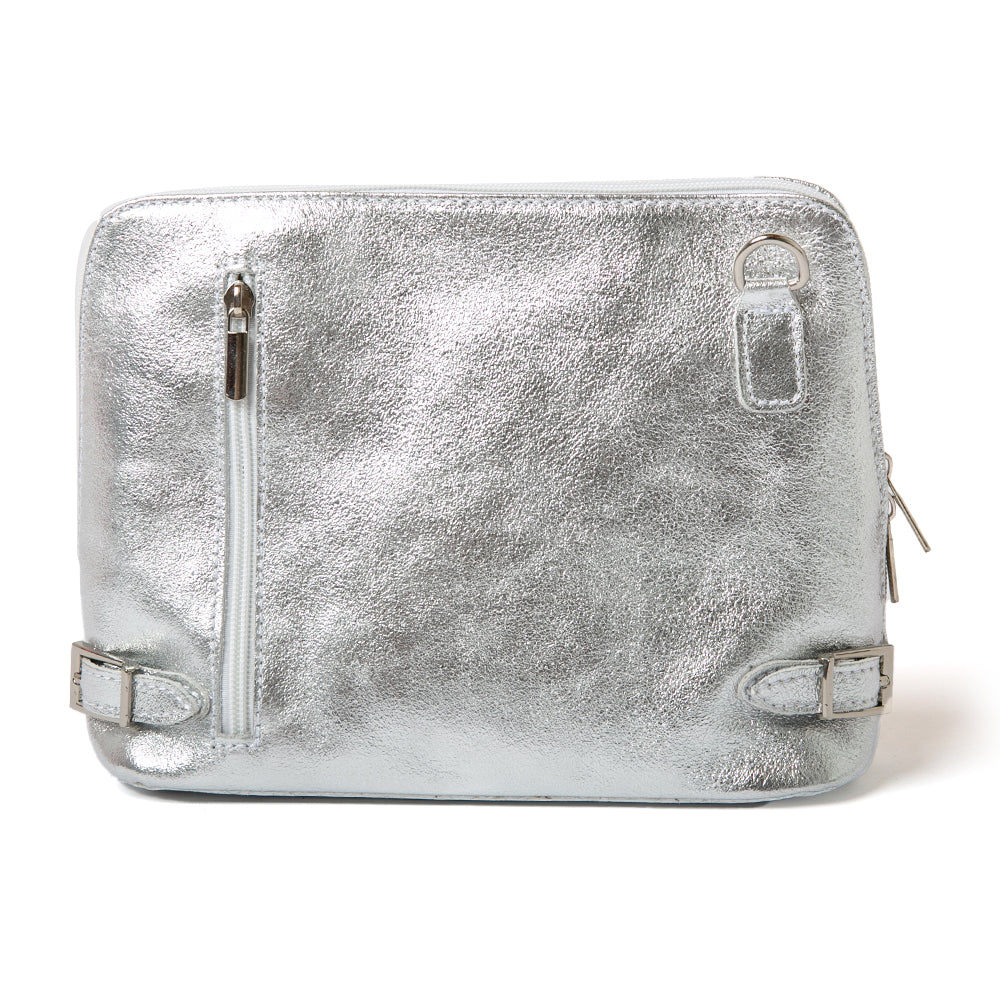 Metallic silver Sloane Handbag, shown from the front, including the adjustable leather strap, three side zip fastening, buckle detail and the outside pocket. Made from Italian leather.