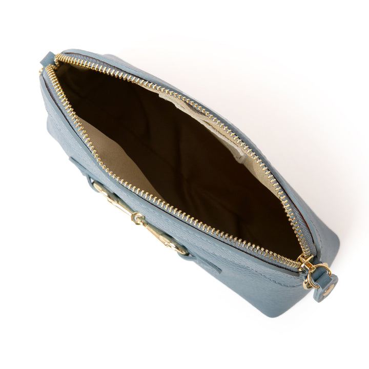 The Sydney Leather Handbag in denim blue with a cotton inner lining