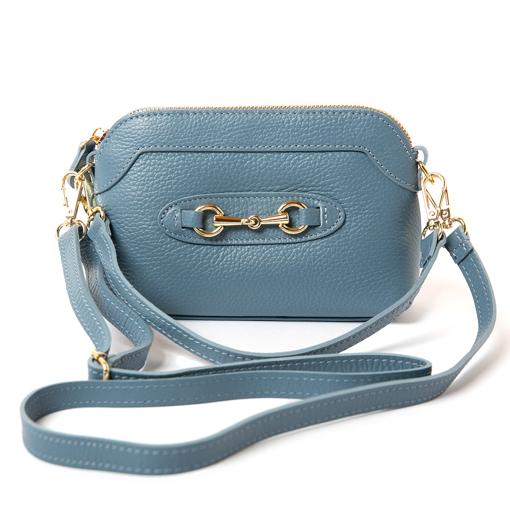 The Sydney Leather Handbag in denim blue with two different detachable leather straps