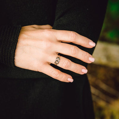 Zeta-womens-adjustable-minimalist-ring-large-interlocking-detail-silver